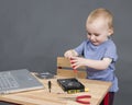 Child working at open hard drive Royalty Free Stock Photo