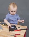 Child working at open hard drive Royalty Free Stock Photo