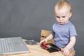 Child working at open hard drive Royalty Free Stock Photo