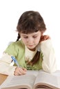 Child writes and reads. Royalty Free Stock Photo