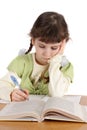 Child writes and reads, isolated Royalty Free Stock Photo