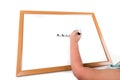 Child writing on a dry erase board