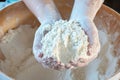 The child plays with the flour when making homemade cakes Royalty Free Stock Photo