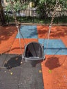 Swing, Bucket Toddler Swing Seat In A Public Playground, NYC, NY, USA