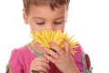 Child with yellow flower