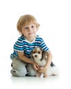 Child and yorkshire terrier. isolated on white background Royalty Free Stock Photo