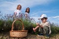 Children pick lavender flowers