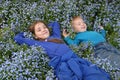 Childern in flowers_1 Royalty Free Stock Photo