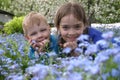 Childern in flowers_2 Royalty Free Stock Photo