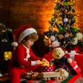 Childhood activity and game. Christmas attributes. Family holiday. Childhood memories. Santa boy celebrate christmas at