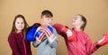 Childhood activity. Sport success. Team fight. workout of small girls and boy boxer in sportswear. Happy children in Royalty Free Stock Photo