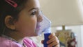 Childhood asthma inhaling mask illnesses little baby girl with flu id doing aerosol independently