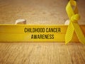 Childhood cancer awareness text background. Health care concept.