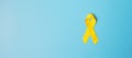 Childhood Cancer, Sarcoma, bone, bladder and Suicide prevention Awareness month, Gold Yellow Ribbon for supporting people living Royalty Free Stock Photo