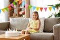 Happy birthday girl with cake at home party Royalty Free Stock Photo