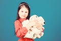 Childhood concept. Small girl smiling face with toys. Happy childhood. Little girl play with soft toy teddy bear. Lot of Royalty Free Stock Photo