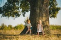 Childhood on countryside. Happy little farmers having fun on field. Ecology concept child. Eco life. Springtime on the Royalty Free Stock Photo