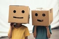 Childhood creativity two little girls wearing cardboard boxes on heads