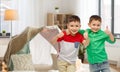 Happy smiling little boys showing thumbs up Royalty Free Stock Photo