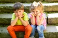 Childhood first love. summer holiday and vacation. small girl and boy on stairs. Relations. couple of little children Royalty Free Stock Photo