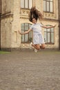 childhood happiness of teen girl jumping outside. image of childhood happiness of teen girl. Royalty Free Stock Photo