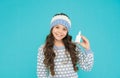 childhood healthcare. teen girl with nasal spray. no addiction to medicals. kid in warm sweater