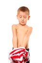 Childhood independence concept - little boy dressing up