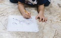 Childhood learning to use a pencil to draw and write on paper. Royalty Free Stock Photo