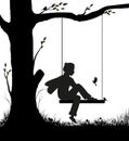 Childhood memories, boy sitting on the swing and looking at the titmouse birds, dreamy park scene in black and white Royalty Free Stock Photo