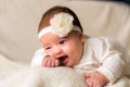 Childhood, motherhood, emotions, fashion concepts - Cute smiling happy chubby baby close up little girl in beautiful Royalty Free Stock Photo