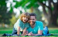 Childhood and parenthood kids concept. Happy father and son playing together outdoor. Royalty Free Stock Photo