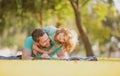 Childhood and parenthood kids concept. Happy father and son playing together outdoor. Royalty Free Stock Photo