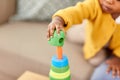 Close up of african baby playing toy blocks Royalty Free Stock Photo
