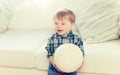 Happy little baby boy with ball at home Royalty Free Stock Photo