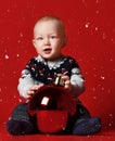 happy little baby boy with ball at home over snow Royalty Free Stock Photo