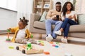 African baby girl playing with toy blocks at home Royalty Free Stock Photo