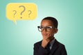 Childhood and people concept- pensive little african american boy in business suit and in glasses