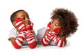Childhood and people concept-preschool aged african american siblings looking to each others, solated on white background