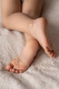 Childhood, sleep, relaxation, family, lifestyle concept - Bare feet of little sleeping girl Royalty Free Stock Photo