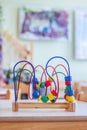 Childhood and socialization concept: Colorful wooden toy in the kindergarten