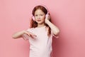 Childhood sound headphones background cute little small listen audio girl music kid enjoying children Royalty Free Stock Photo