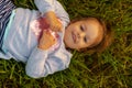 Childhood, summer, leisure and entertainment concept - close-up top view of a little cute three year old blond-haired Royalty Free Stock Photo