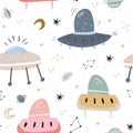 Childish seamless pattern with aliens, ufo in cosmos. Perfect for kids apparel,fabric, textile, nursery decoration,wrapping paper