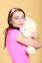 Childish woman infantile girl hugging teddy bear Royalty Free Stock Photo