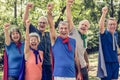 Childlike seniors wearing superhero costumes Royalty Free Stock Photo