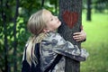 Childn embracing tree. Environmental protection outdoor nature. Conservation outdoors Royalty Free Stock Photo