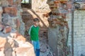 Children in an abandoned and destroyed building in the zone of military and military conflicts. The concept of social problems of