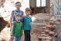 Children in an abandoned and destroyed building in the zone of military and military conflicts. The concept of social problems of