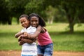 Children african boy and girl in love hugging