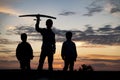 Children with airplane toy outdoors